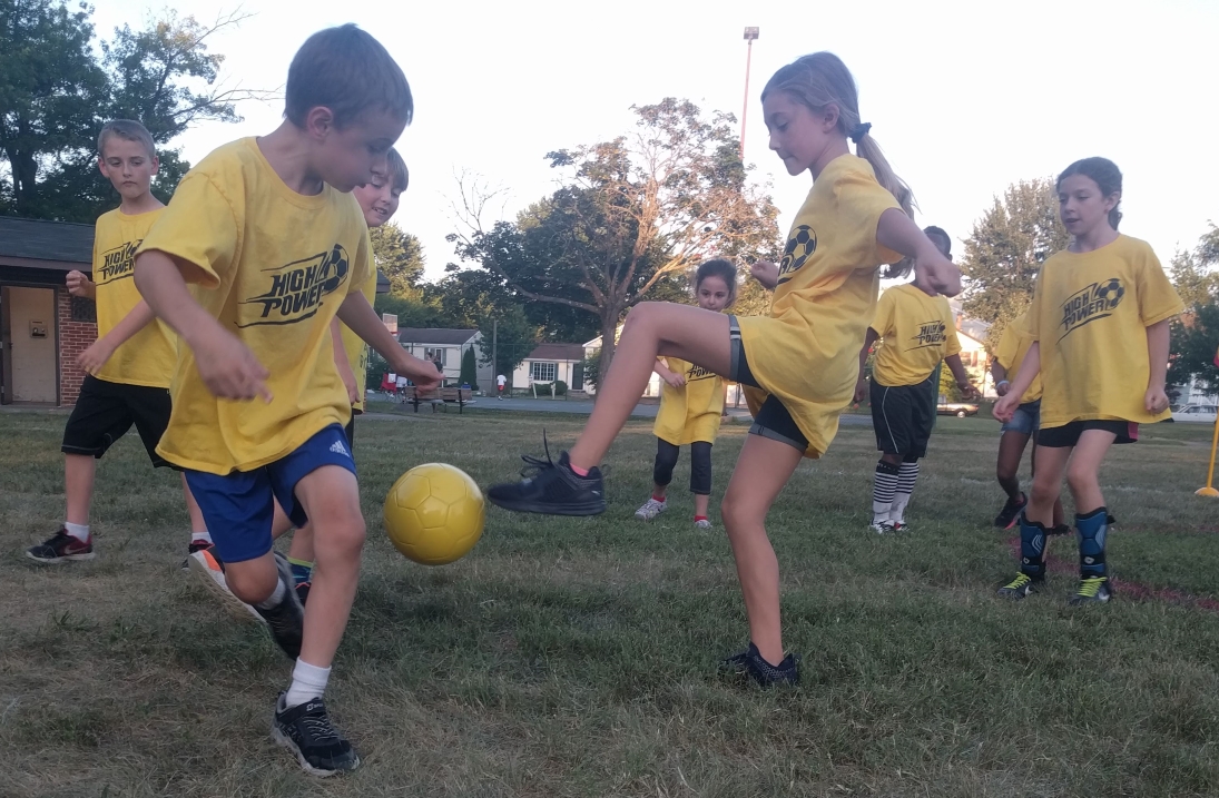 soccer camp kick ball